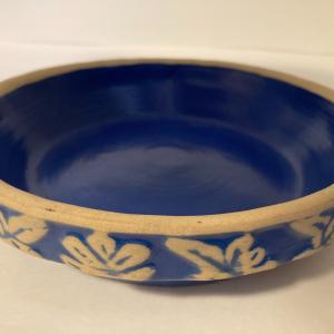 Photo of Blue stoneware pie   plate with floral leaf border marked 8 on bottom