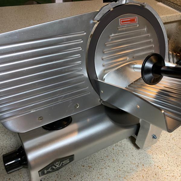 Photo of Stainless-steel meat slicer 