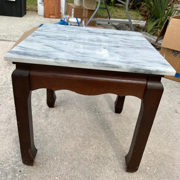 Photo of Marble topped end table