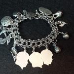 STERLING SILVER CHARM BRACELET