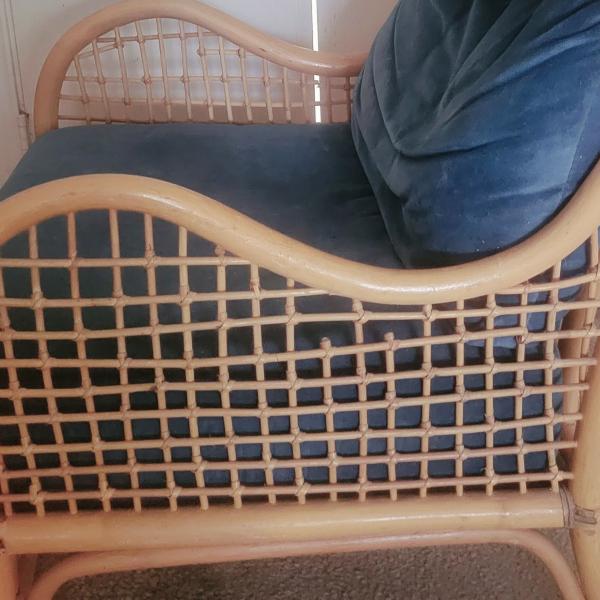 Photo of Vintage bamboo cushioned chair