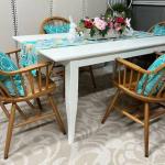 White Table and four Captains Chairs