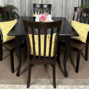 Photo of Dark Dining Table and four Chairs