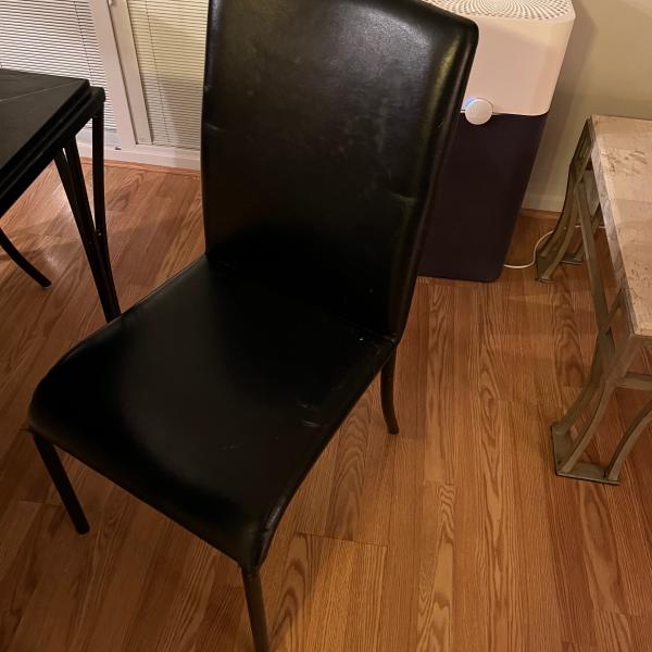 Photo of 4 leather chairs