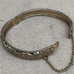 Vintage hinged bracelet with safety chain