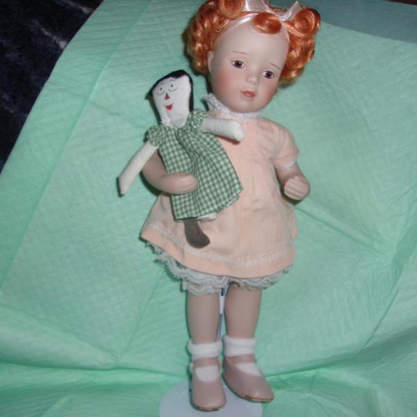 Photo of love is blind porcelain doll