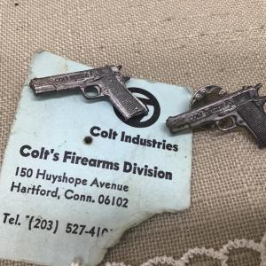 Photo of VINTAGE COLT AUTOMATIC CALIBRE .45 GUN FIREARMS 2 x With Tag CLIP PIN