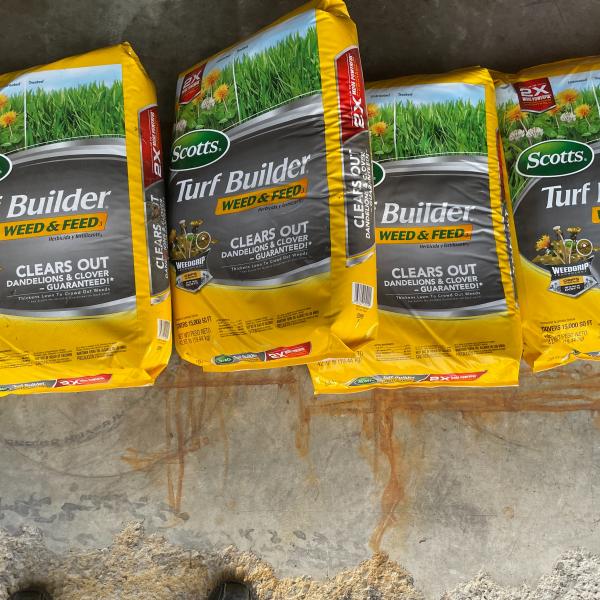 Photo of 4 bags of Scotts Turf Builder 15,000 sq. ft. Weed & Feed Plus Lawn Fertilizer