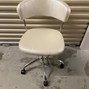 Photo of White leather desk chair 