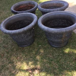 Photo of 4 very large flower pots