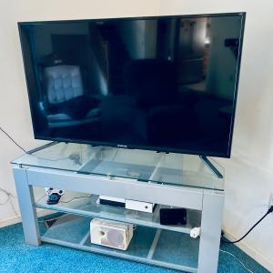 Photo of Tv and glass stand