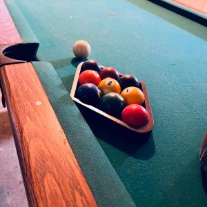 Photo of Pool Table  shuffle board & ping pong table set