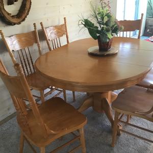 Photo of Solid wood table with 6 chairs,