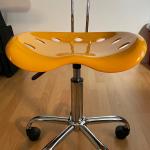 Small Yellow Molded Plastic Chair on Chrome Metal Base with Castors