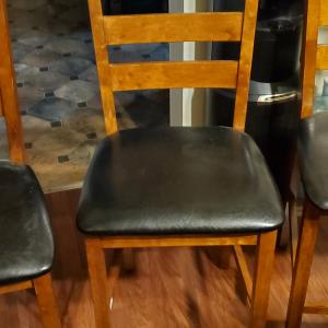 Photo of Dining Room Table and four Chairs.