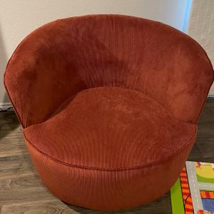 Photo of Burnt orange peachy swirl chair