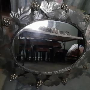 Photo of Vintage Mirror with Floral Designed Frame