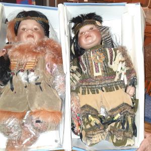 Photo of 2 native American porcelain  dolls 