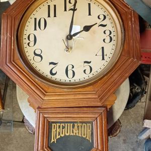 Photo of antique Regulator wall clock