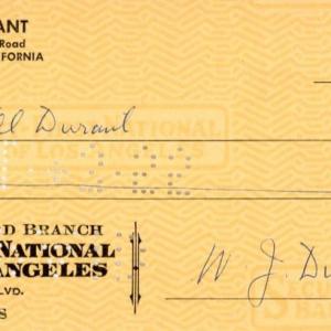 Photo of Walter Cunningham signed check