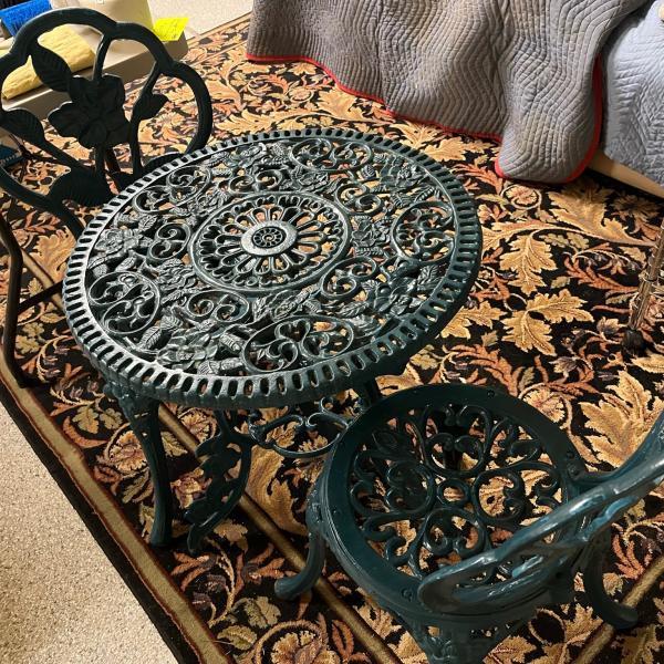 Photo of Cast Iron Table and Chairs