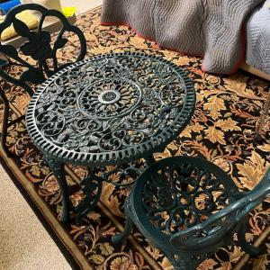 Photo of Cast Iron Table and Chairs