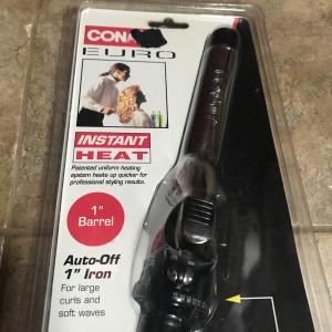 Photo of Curling iron still in box 