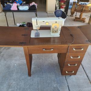 Photo of Antique sewing machine table