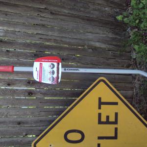 Photo of  Hand tiler   Wide Rake   And a  No outlet sign