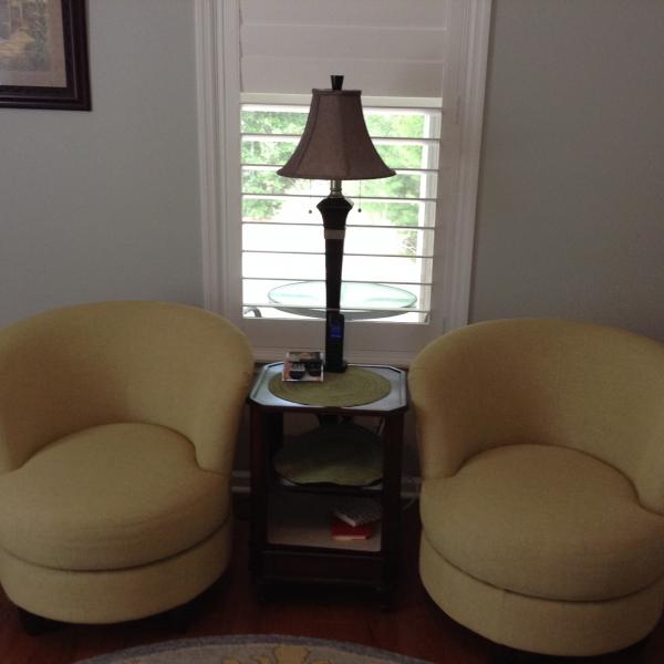Photo of  Two Swivel Barrel Chairs