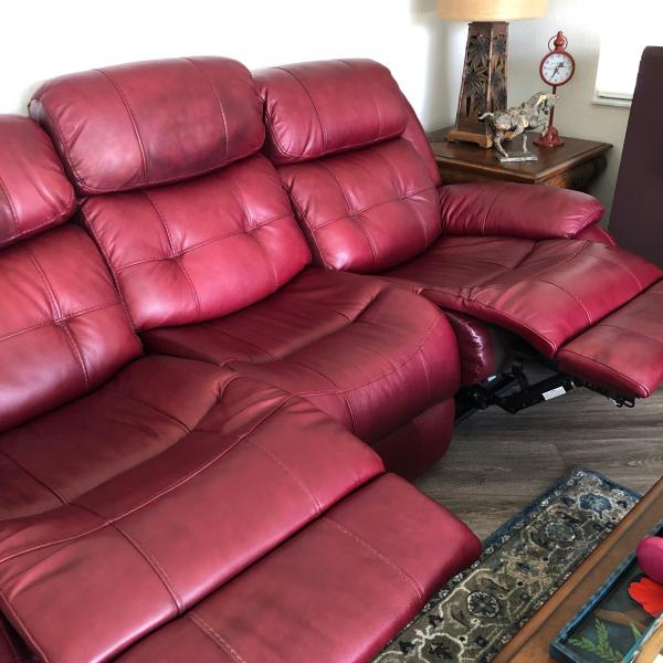 Photo of Leather reclining sofa and loveseat.