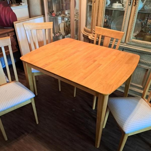 Photo of Dining Room Table with four chairs and sideboard 