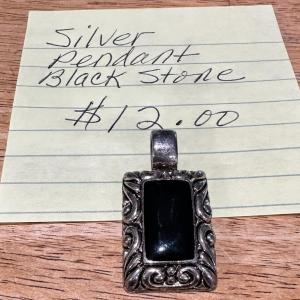 Photo of Silver toned Pendant with Large Black Stone