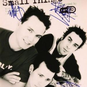 Photo of Blink 182 signed sheet music 