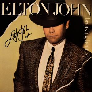Photo of Elton John signed Breaking Hearts album