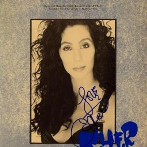 Photo of Cher signed sheet music
