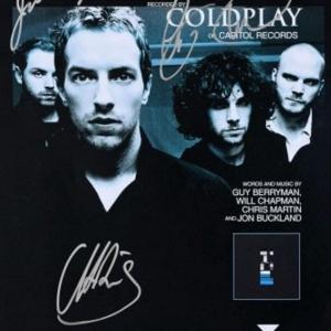 Photo of Coldplay signed sheet music