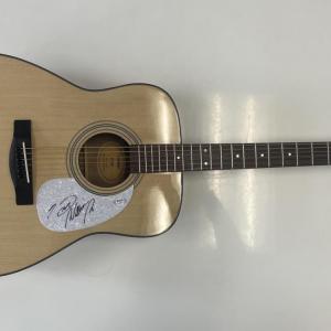 Photo of Hank Williams Jr. signed acoustic guitar- PSADNA