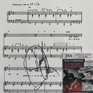 Photo of Donnie Osmond A Little Bit Country signed sheet music. JSA