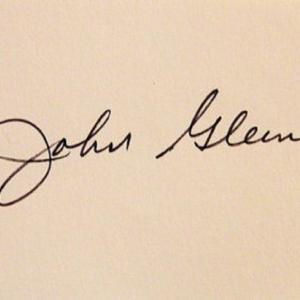 Photo of Astronaut John Glenn signature slip 
