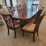 Dinning Table with 8 Chairs and Padding/Extensions