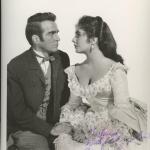 Elizabeth Taylor signed "Raintree County" movie photo. GFA Authenticated