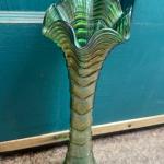 Tall green carnival glass vase
