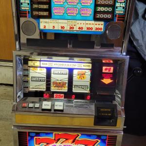 Photo of Bally Gaming 2005 Slot Machine. Quarter machine. Takes paper money only.