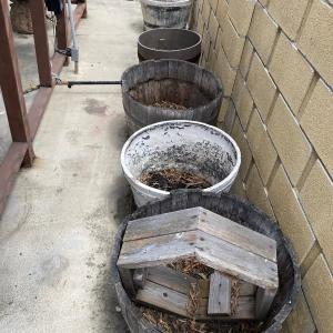 Photo of Lot of Wood and Faux Wood Whiskey Half Barrel Planters