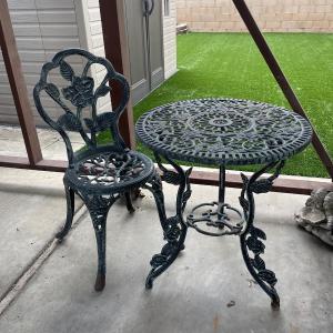 Photo of Small Metal Flower Pattern Bistro Patio Table with Chair