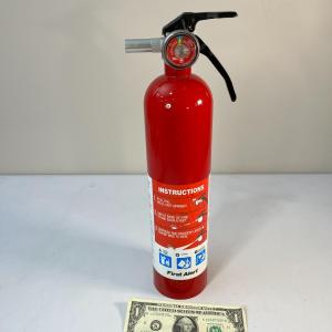 Photo of LOOKS NEW FIRST ALERT FIRE EXTINGUISHER 