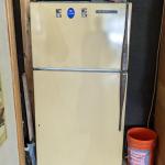 Yellow General Electric Refrigerator