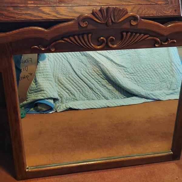 Photo of Antique carved oak mirror