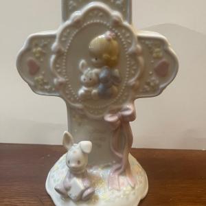 Photo of Precious Moments 1993 licensee Enesco Corporation figurine.  With Cross